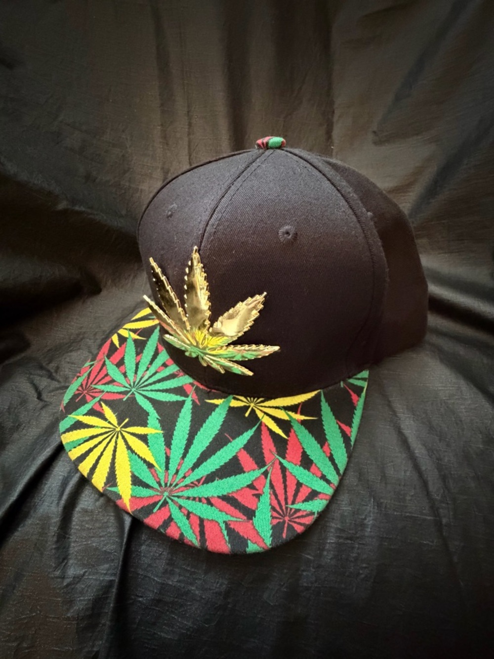 Black Snapback Hat with Gold Leaf & Rasta Pattern
